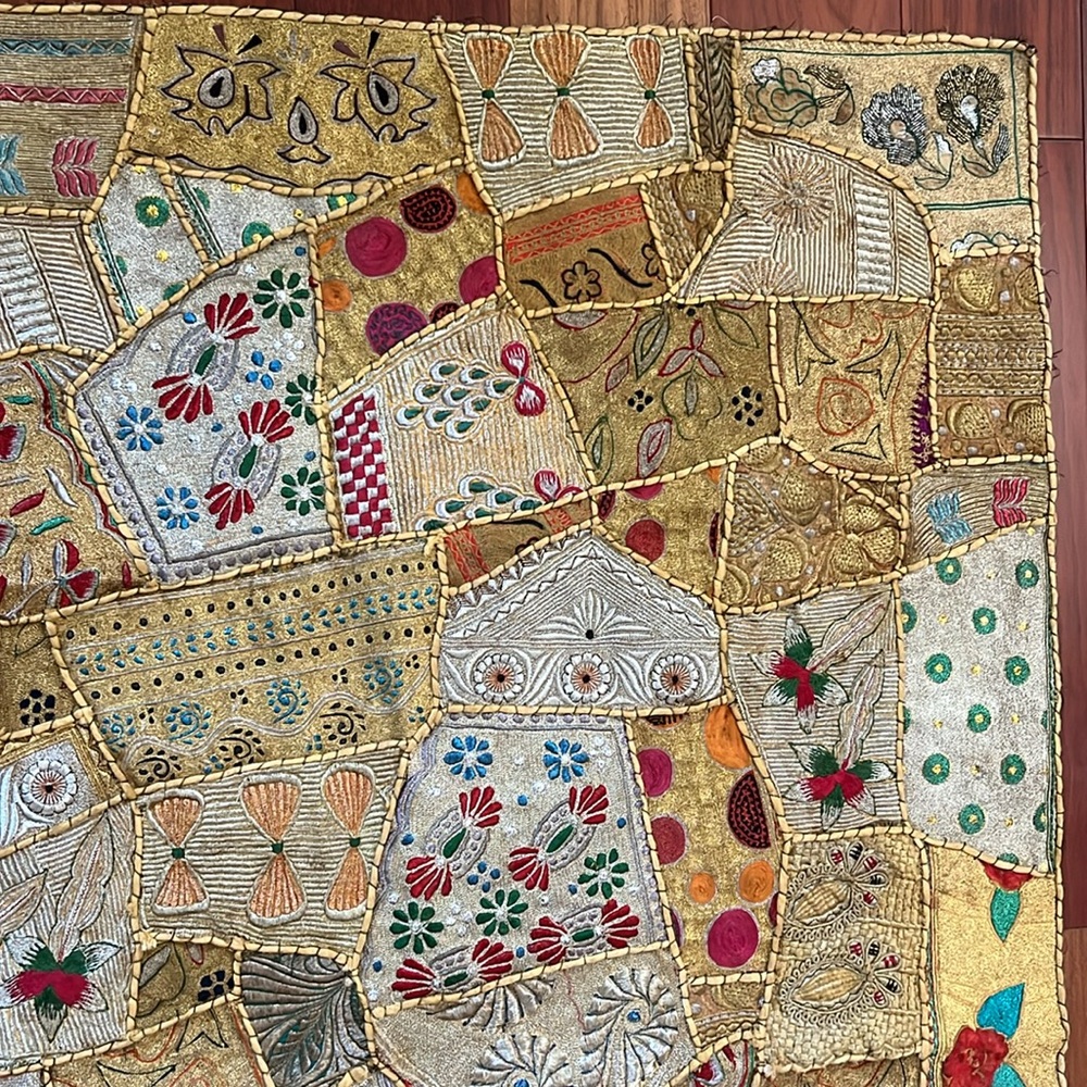 Handcrafted gold patchwork tapestry. Lays flat. Hang or drape it. 38.5” x 57”